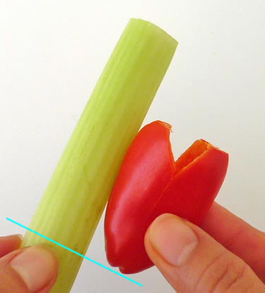 Easy vegetable carving, using celery to be pistils in the flower step 1