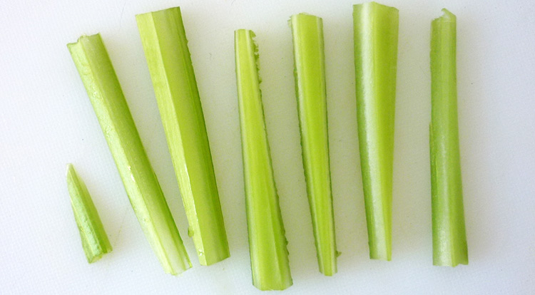 Food art with tomato, cutting celery sticks, celery stalk has the same width on both ends step 2