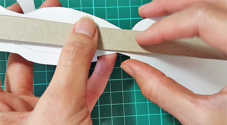 How to make a standing paper doll - stick cardboard behind